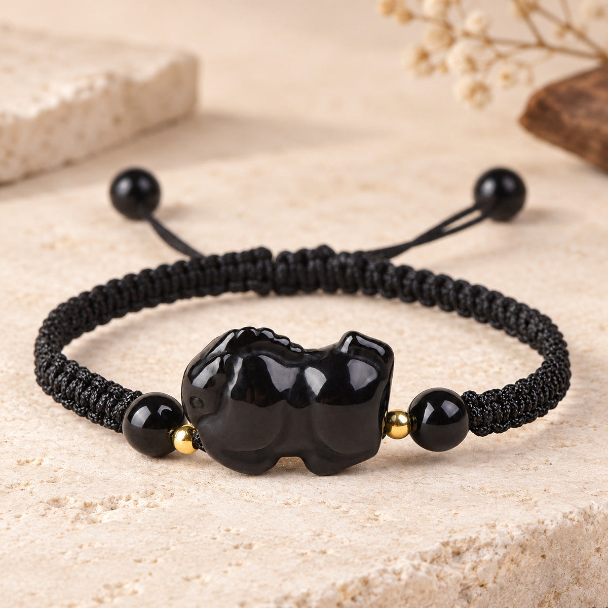 Black obsidian Horse zodiac carving on a braided cord bracelet