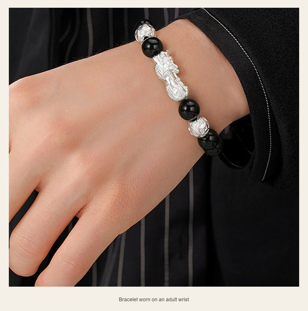 10 mm Obsidian & Fine Silver Pixiu Bracelet — bracelet worn on an adult wrist