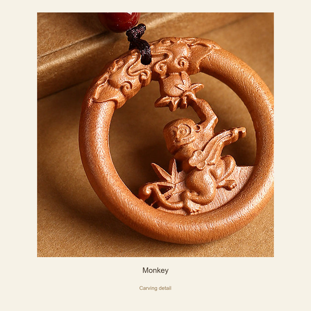Peach Wood Round Chinese Zodiac Pendant — Monkey, detail view #zodiac_monkey