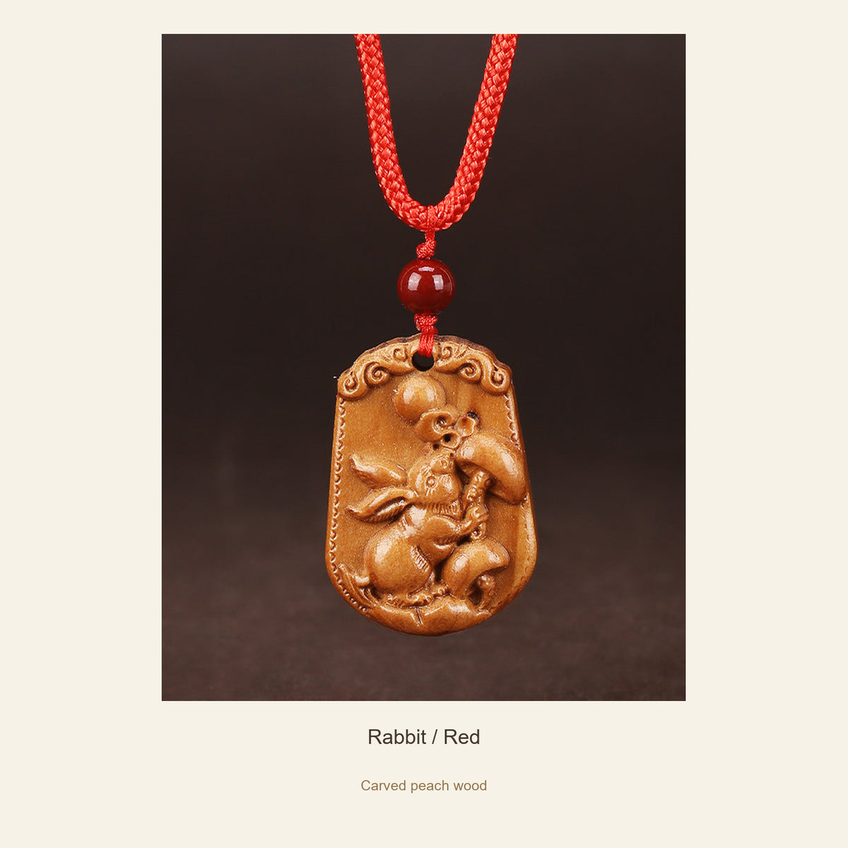 Peach Wood Chinese Zodiac Relief Necklace — Rabbit / Red, full design view #zodiac_rabbit