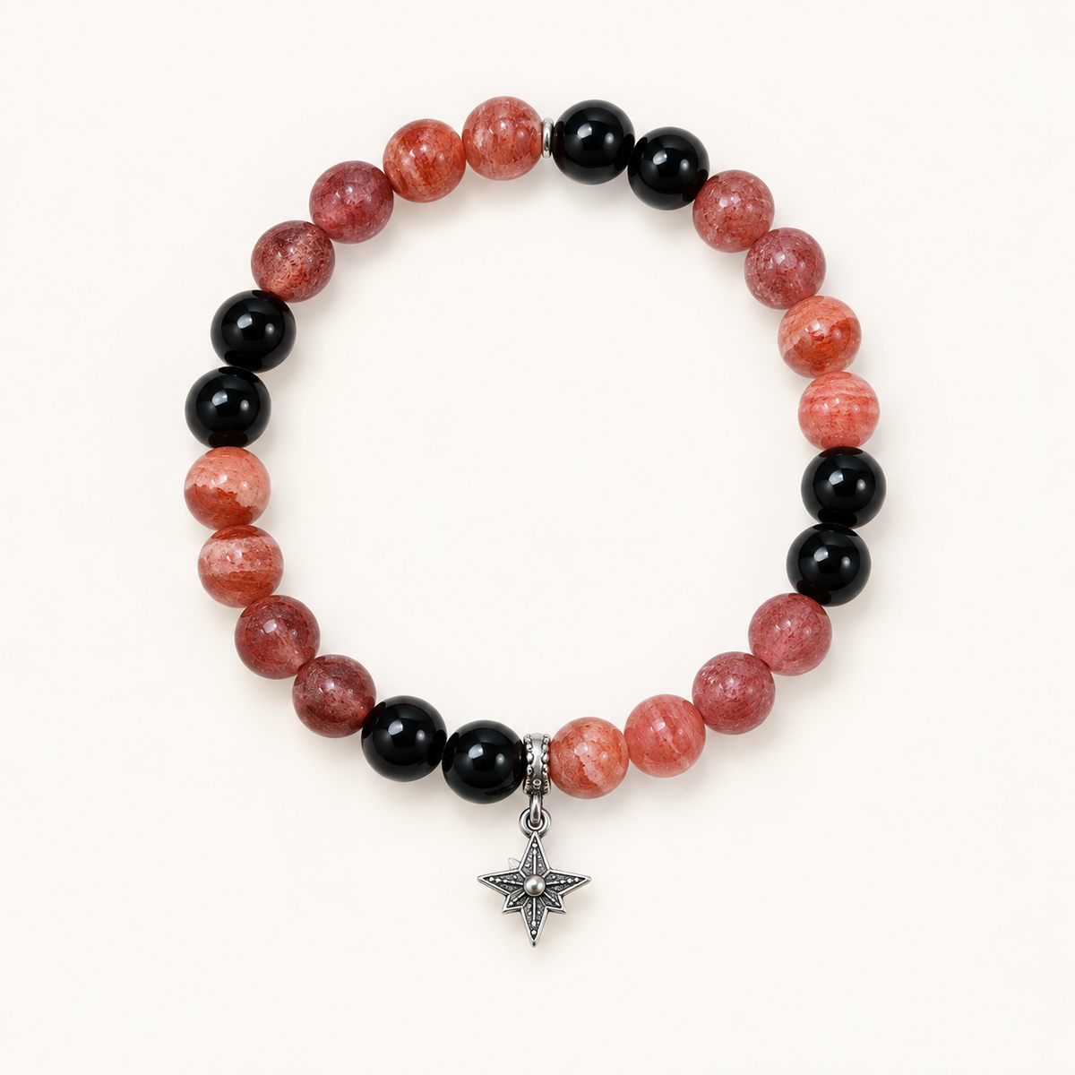 Strawberry Quartz, Rhodochrosite & Sunstone Bracelet on an ivory background