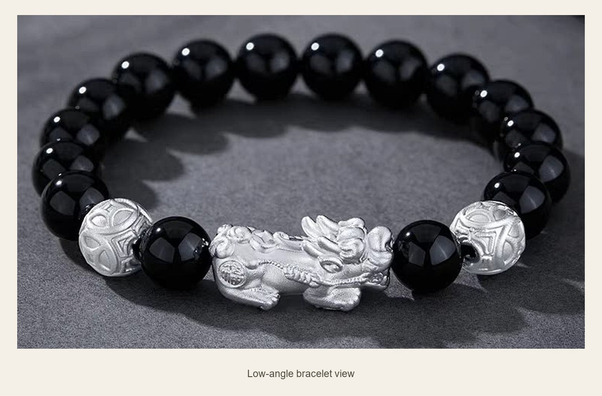 10 mm Obsidian & Fine Silver Pixiu Bracelet — low-angle bracelet view