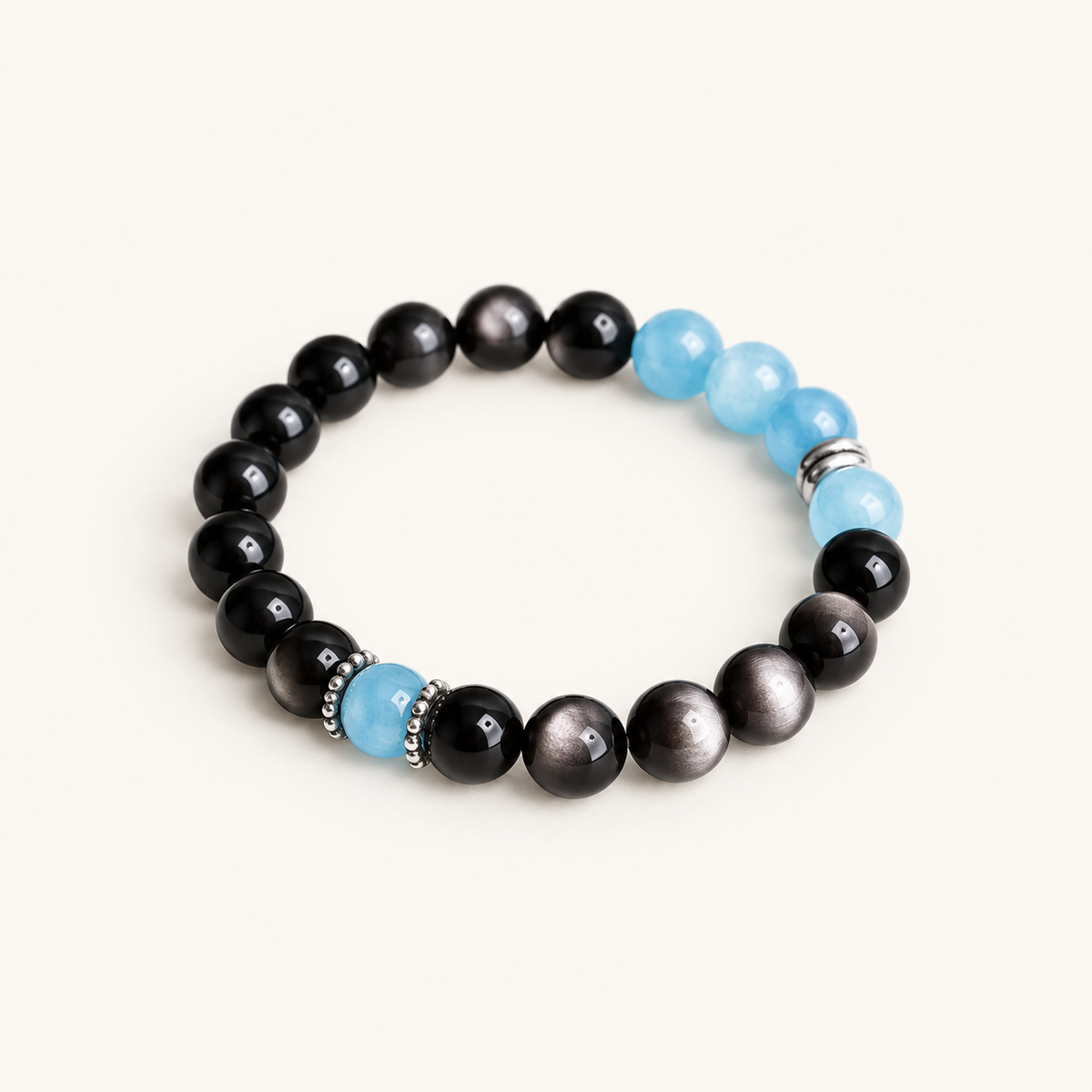 Aquamarine & Obsidian Bead Bracelet on an ivory background