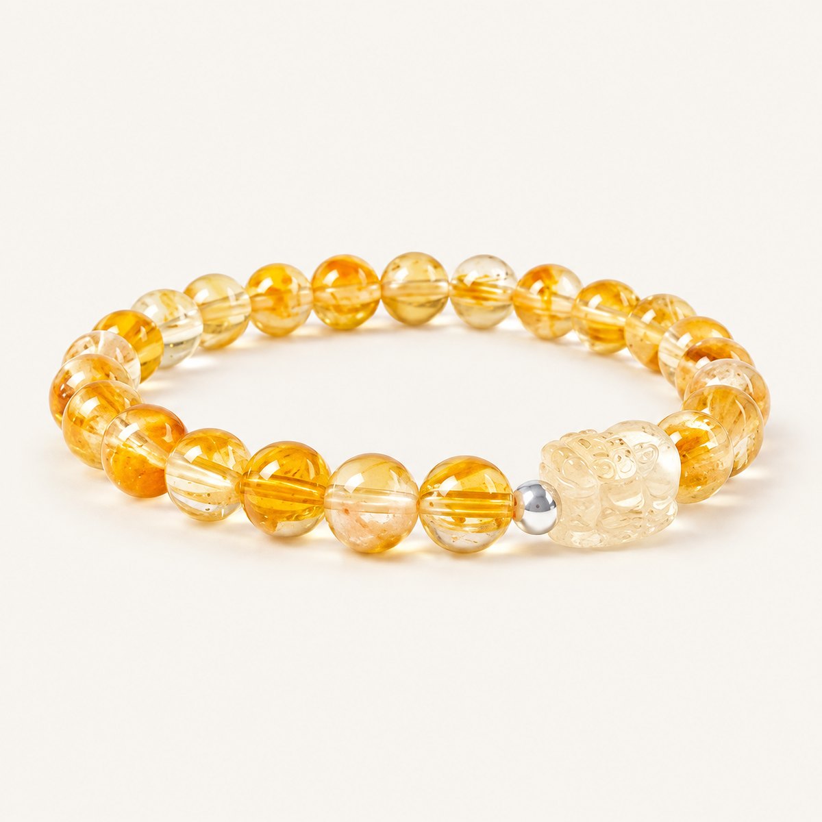 Citrine Bead Pixiu Bracelet on an ivory background