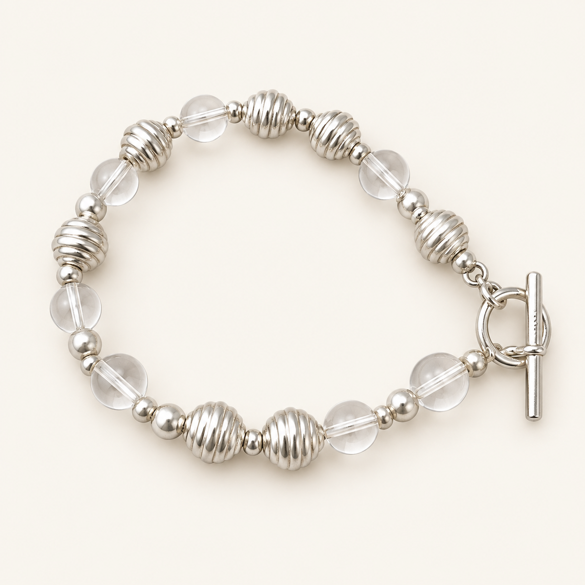 Clear Quartz & S925 Silver Bracelet on an ivory background