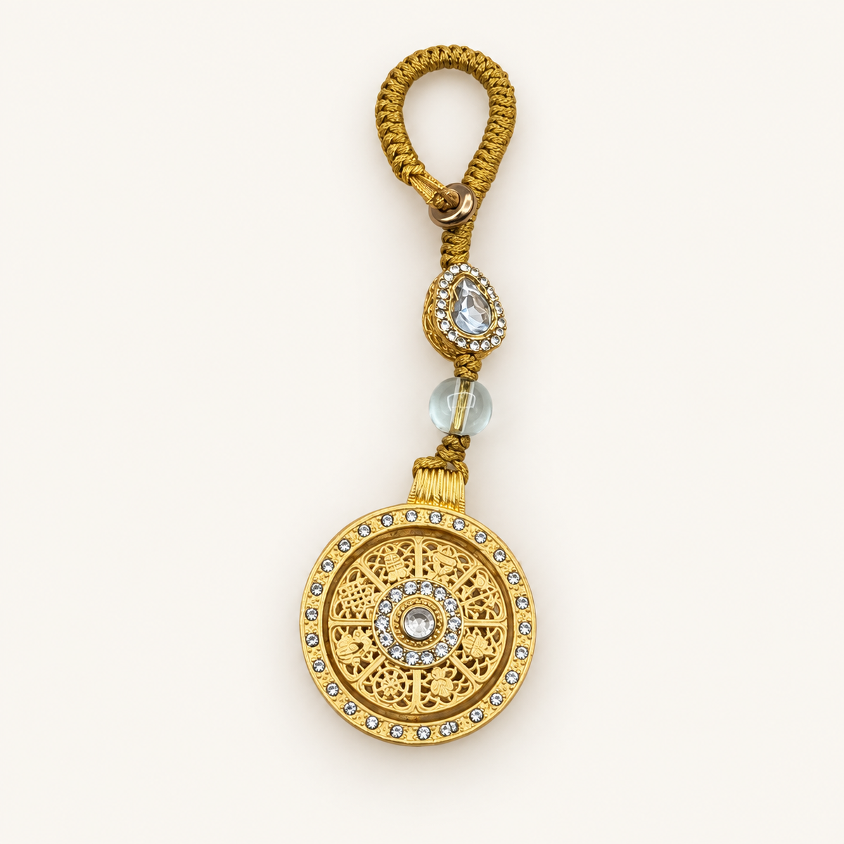 Eight Treasures Compass & Gourd Keychain on an ivory background