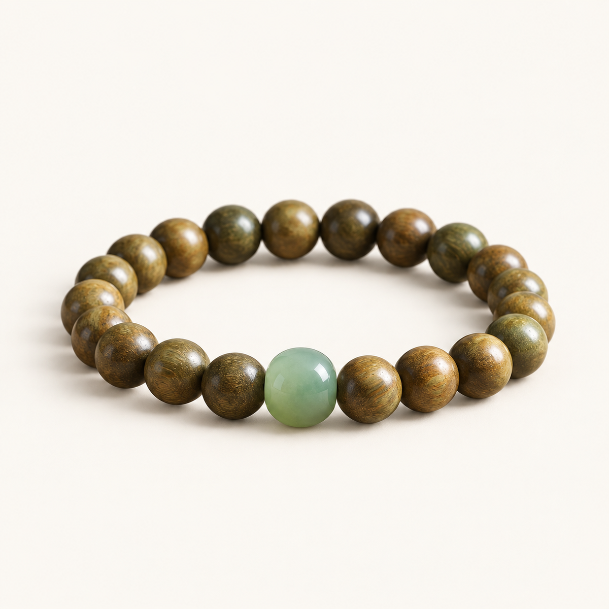 Green Sandalwood Bead Bracelet on an ivory background