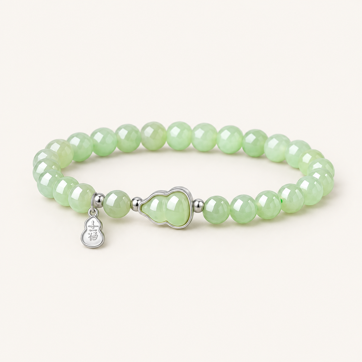Hetian Jade & S925 Silver Gourd Bracelet on an ivory background