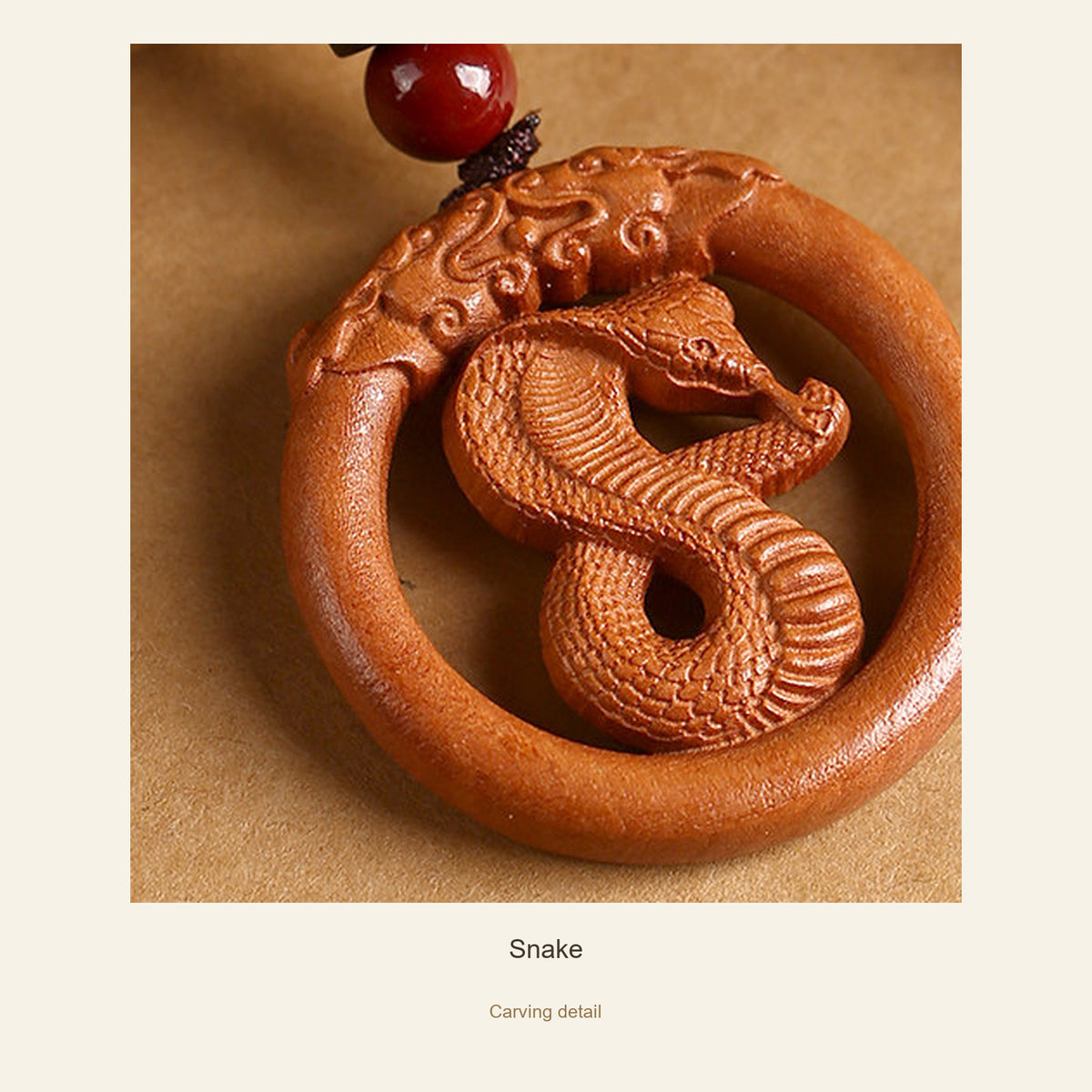 Peach Wood Round Chinese Zodiac Pendant — Snake, detail view #zodiac_snake