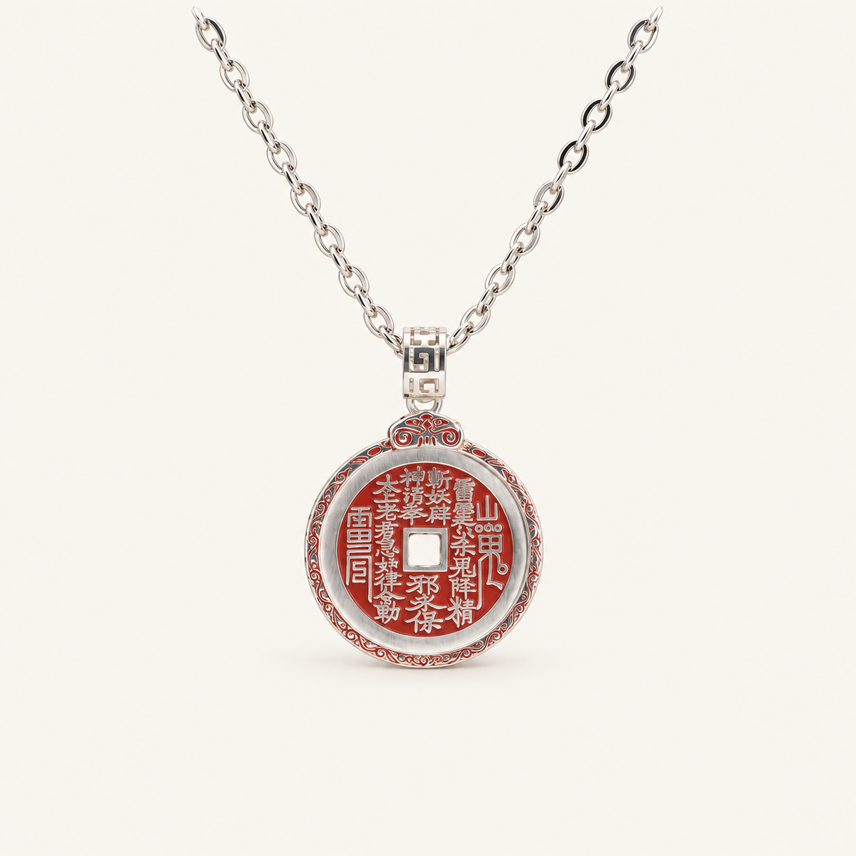 Silver & Cinnabar Mountain Spirit Pendant on an ivory background